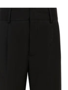 Pantaloni per bambina John Richmond Junior nero con pieghe frontali - Rubino Kids
