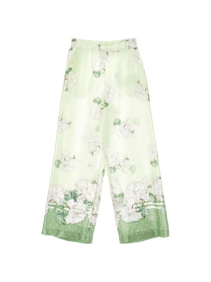 Pantaloni per bambina Monnalisa verde con stampa a fiori