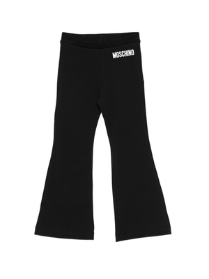 Moschino Kids black flared trousers with logo decoration for girls