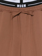 Pantaloni per bambina MSGM Kids marroni con coulisse elasticizzata in vita - Rubino Kids