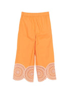 Pantaloni per bambina Stella McCartney Kids arancioni con orlo smerlato - Rubino Kids
