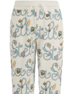 Pantaloni per bambina Stella McCartney Kids bianchi con logo all - over - Rubino Kids