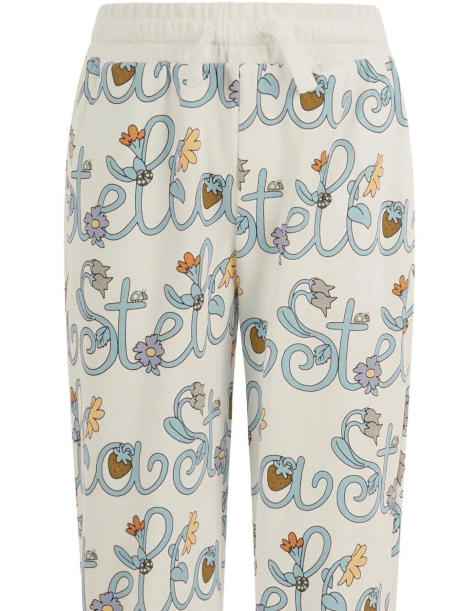 Pantaloni per bambina Stella McCartney Kids bianchi con logo all - over - Rubino Kids