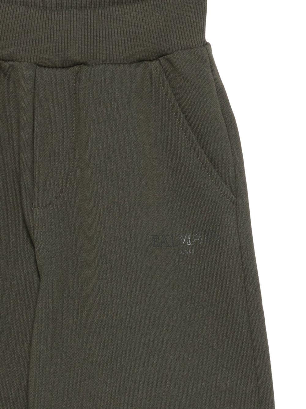 Pantaloni per bambino Balmain Kids verdi con logo - Rubino Kids