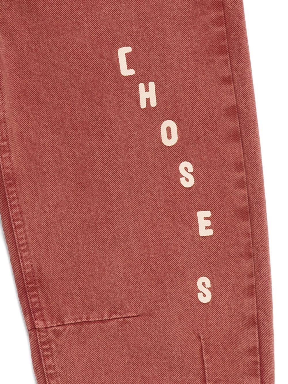 Pantaloni per bambino Bobo Choses rossi con logo sul davanti - Rubino Kids