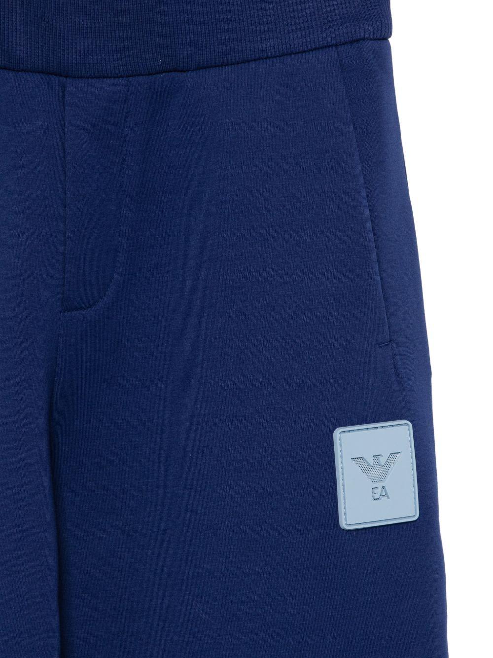 Pantaloni per bambino Emporio Armani Kids blu con logo sul davanti - Rubino Kids