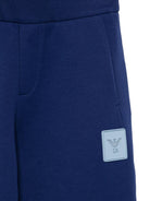 Pantaloni per bambino Emporio Armani Kids blu con logo sul davanti - Rubino Kids