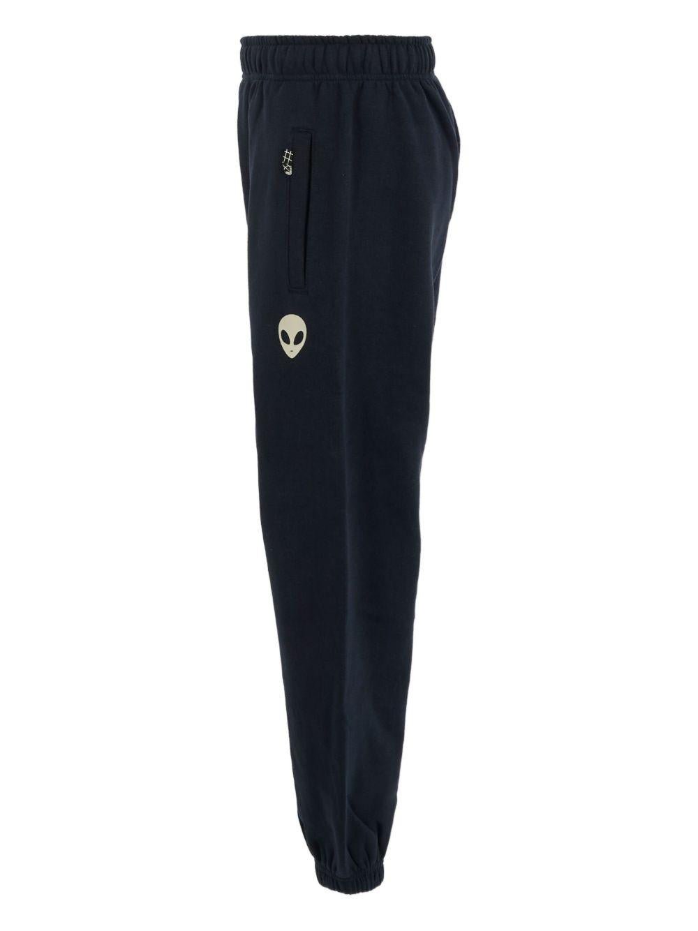 Pantaloni per bambino Molo blu con orli elasticizzati e motivo alieno - Rubino Kids