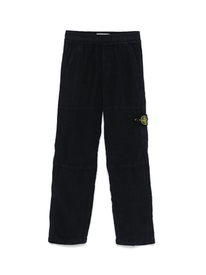 Pantaloni per bambino Stone Island Junior blu con applicazione Compass