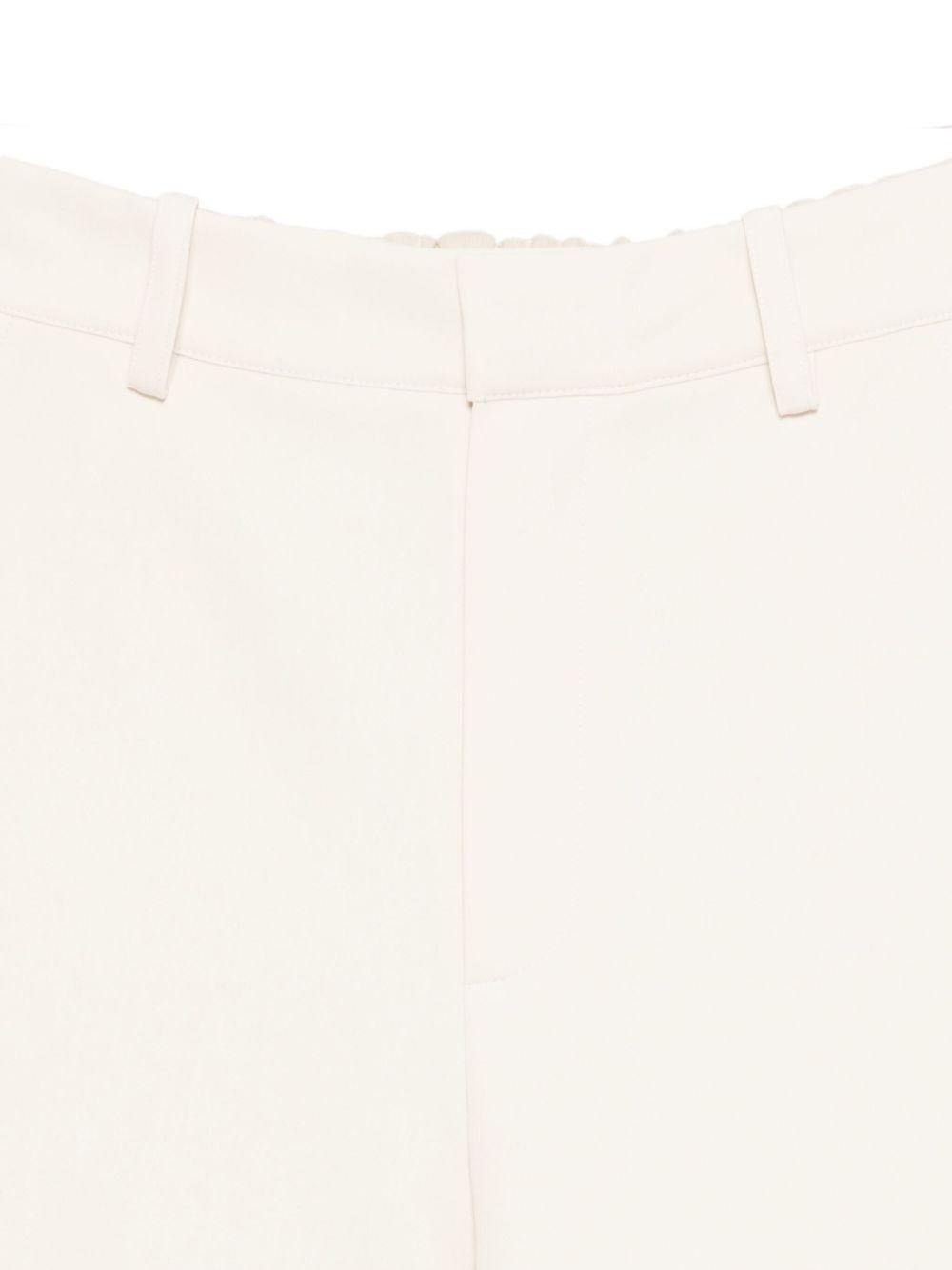 Pantaloni per donna Alysi bianchi con tasche posteriori a filetto - Rubino Kids