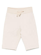 Pantaloni per neonato Emporio Armani Kids beige con motivo all - over - Rubino Kids
