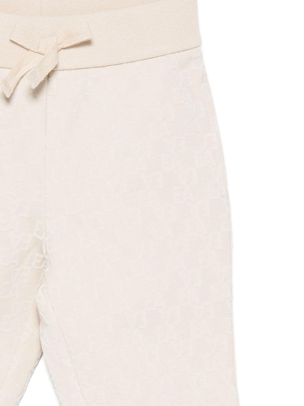 Pantaloni per neonato Emporio Armani Kids beige con motivo all - over - Rubino Kids