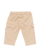 Pantaloni per neonato Moschino Kids beige con ricamo Teddy sul davanti - Rubino Kids