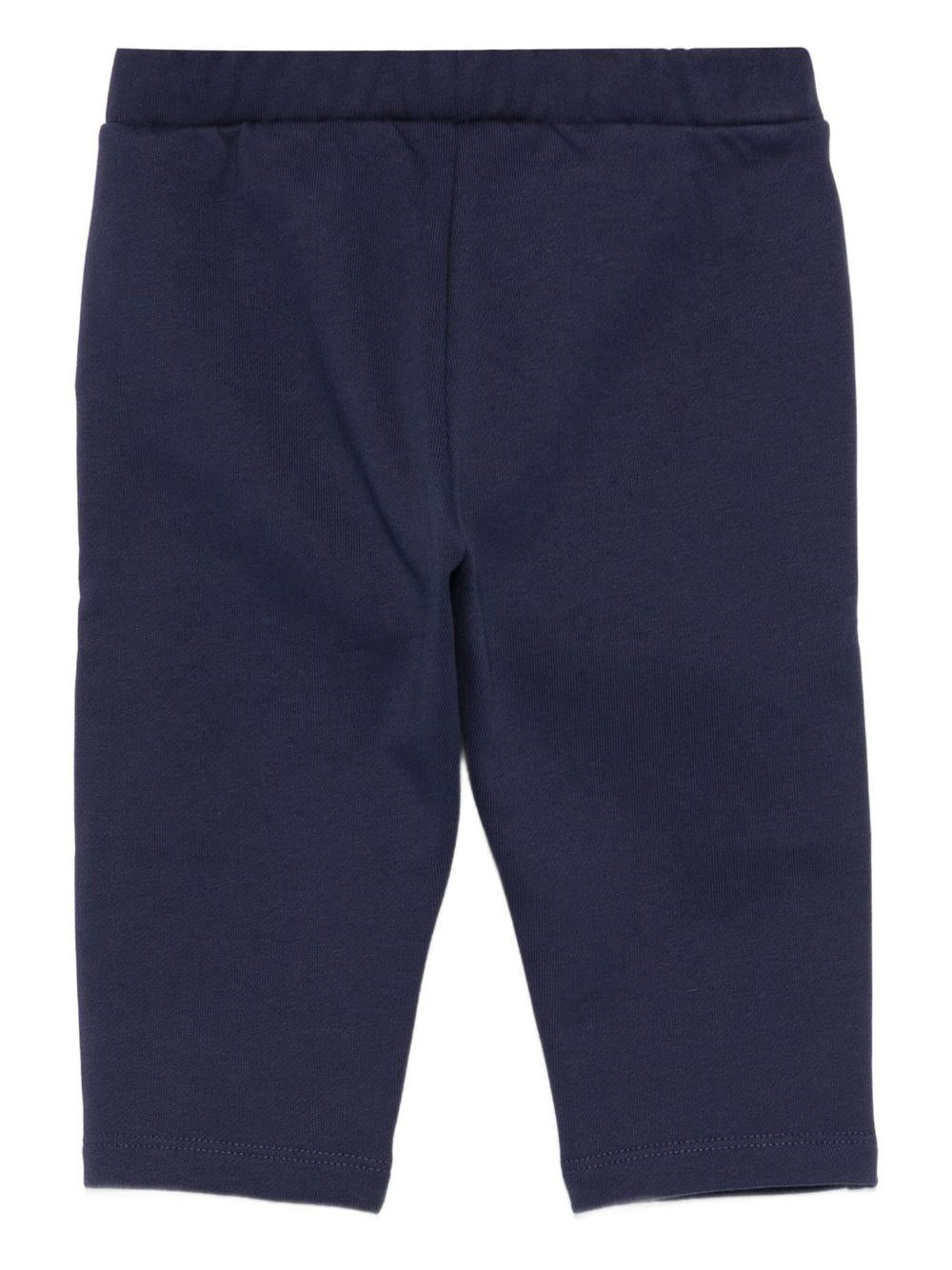 Pantaloni per neonato Moschino Kids blu con logo Teddy Bear - Rubino Kids