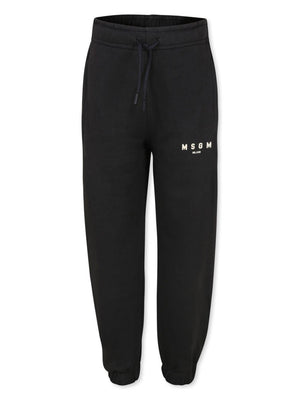 Black sweatpants for boys with MSGM Kids logo print
