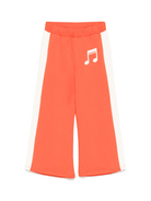 Pantaloni sportivi per bambina Mini Rodini Note rosso con dettaglio laterale a righe - Rubino Kids