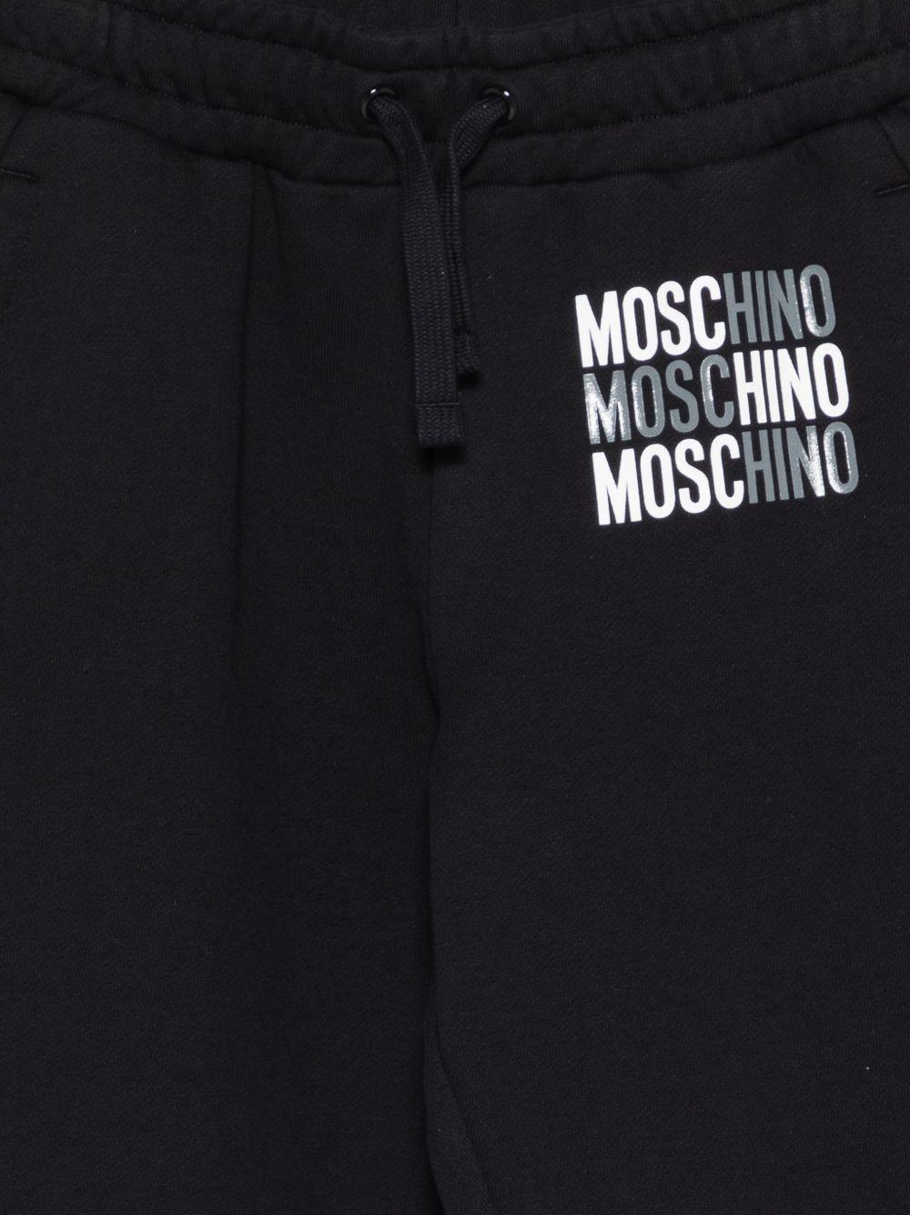 Pantaloni sportivi per bambino Moschino Kids neri con logo sul davanti - Rubino Kids