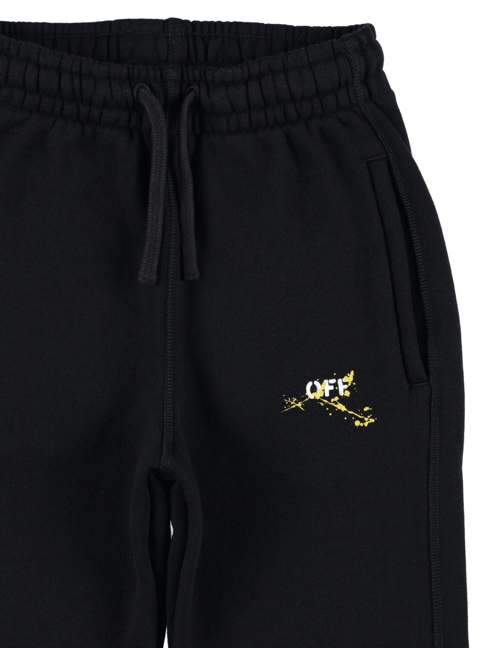 Pantaloni sportivi per bambino Off - White Kids con stampa effetto vernice spray - Rubino Kids