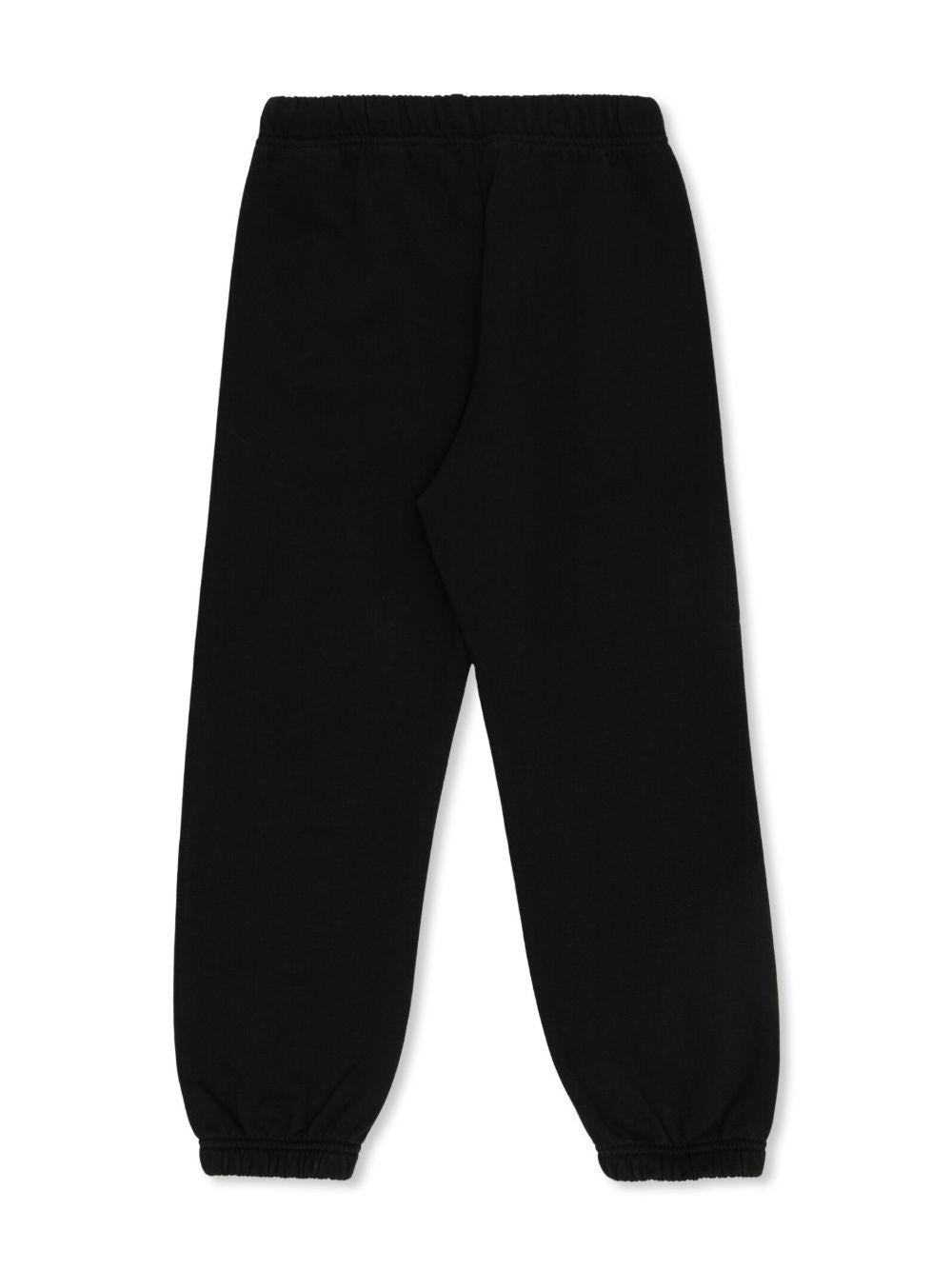 Pantaloni sportivi per bambino Palm Angels Kids neri con logo sul davanti - Rubino Kids