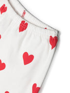 Pigiama per bambina Petit Bateau bianco con motivo a cuori - Rubino Kids