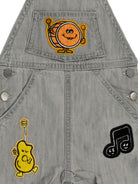 Salopette per neonato Stella McCartney Kids grigia con stampa grafica musicale - Rubino Kids