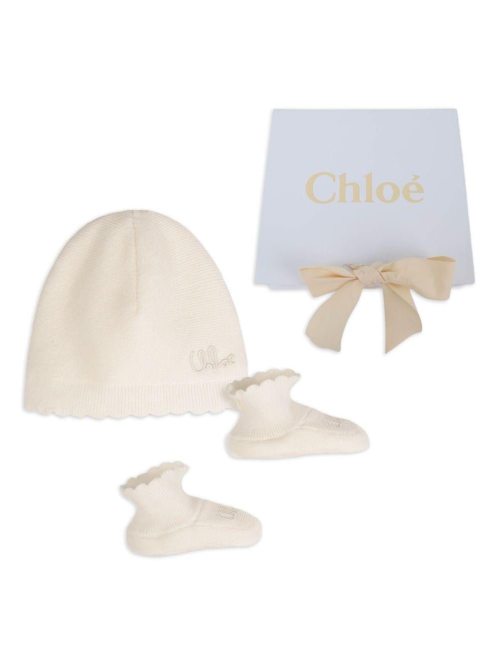 Set berretto e scarpette per neonata Chloé Kids bianco con orlo a smerlo - Rubino Kids