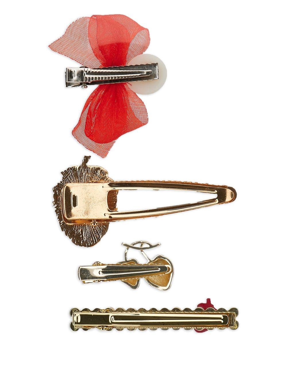 Set di quattro fermacapelli per bambina Monnalisa rossi con varie fantasie - Rubino Kids