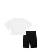 Set t-shirt e shorts per bambina Moschino Kids bianco e nero con motivo Teddy Bear - Rubino Kids