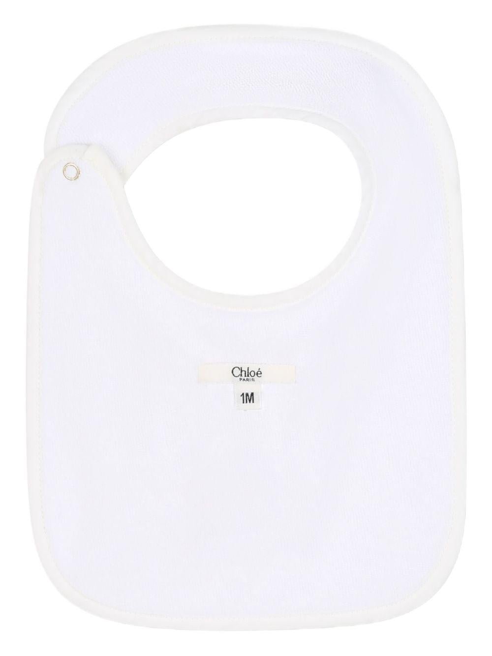 Set tutina e bavaglini per neonata Chloé Kids beige con chiusura con bottone a pressione - Rubino Kids