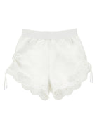 Shorts per bambina Monnalisa bianchi con ricamo a fiori - Rubino Kids