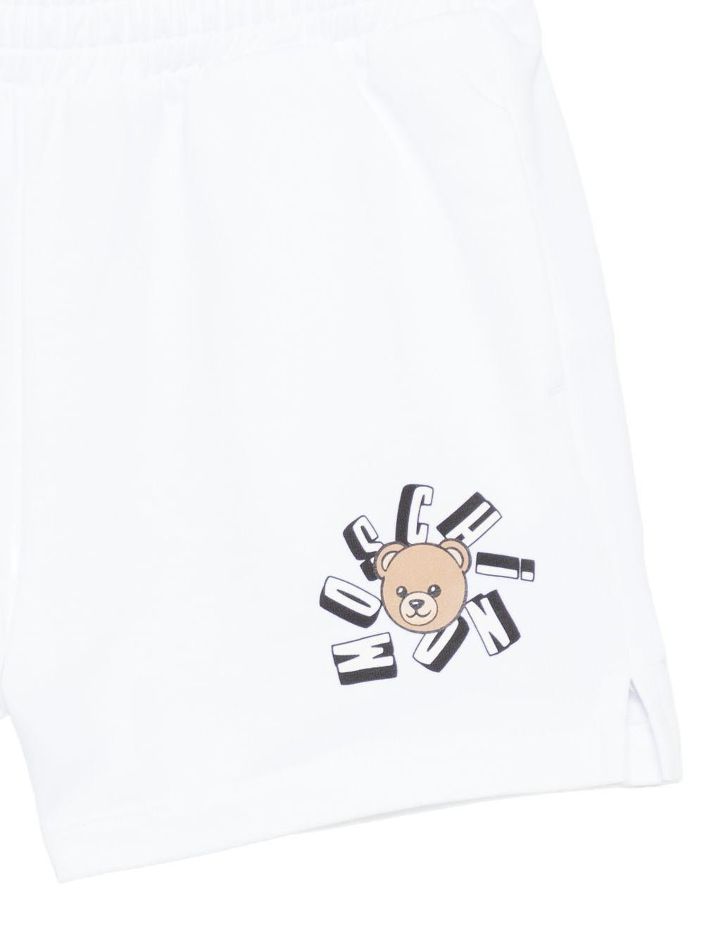 Shorts per bambini Moschino Kids bianchi con stampa Teddy Bear - Rubino Kids