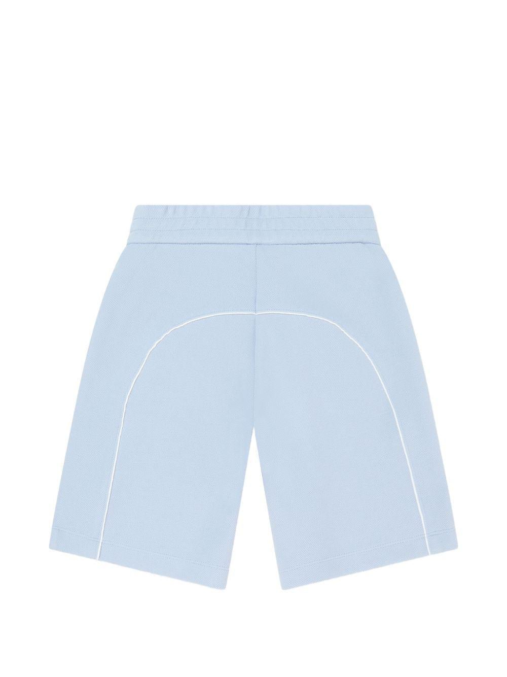 Shorts per bambino Emporio Armani Kids azzurri con logo aquila sul davanti - Rubino Kids