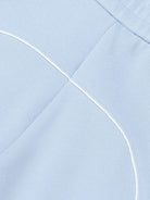 Shorts per bambino Emporio Armani Kids azzurri con logo aquila sul davanti - Rubino Kids