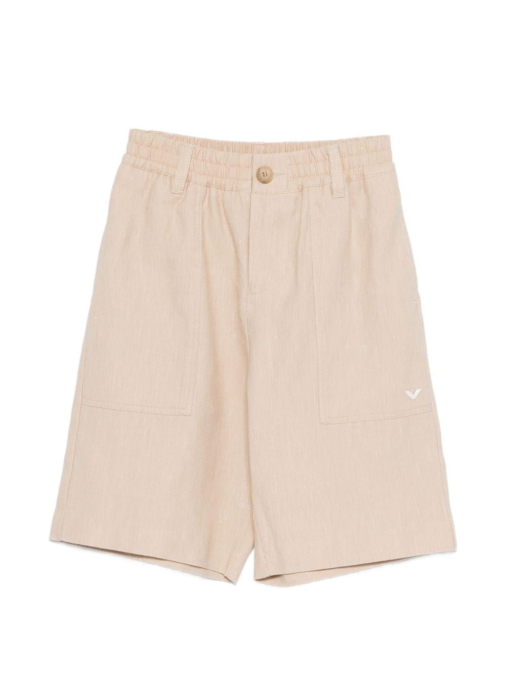Shorts per bambino Emporio Armani Kids beige con logo aquila sul davanti - Rubino Kids