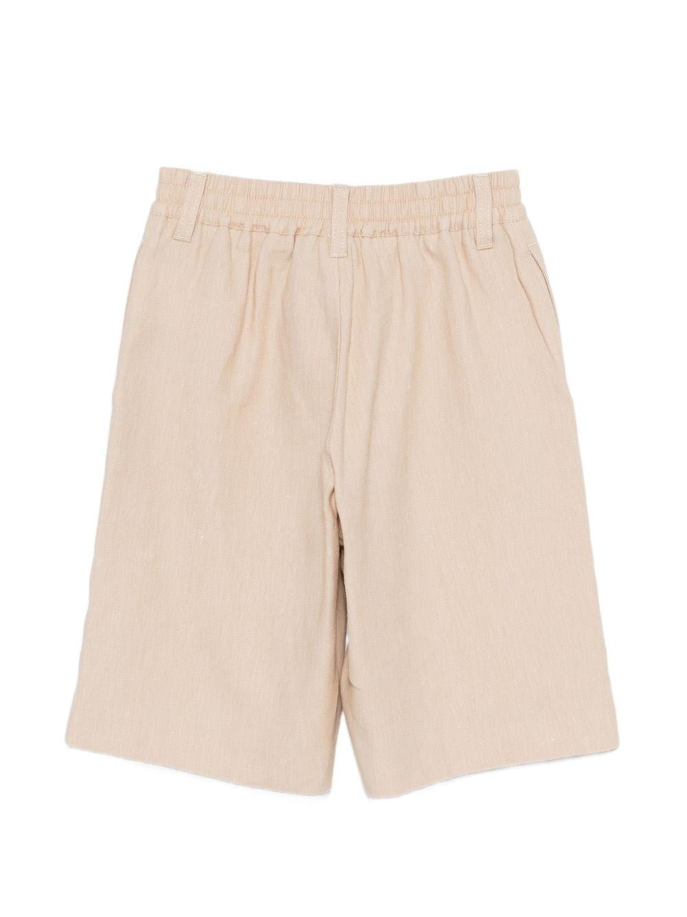 Shorts per bambino Emporio Armani Kids beige con logo aquila sul davanti - Rubino Kids