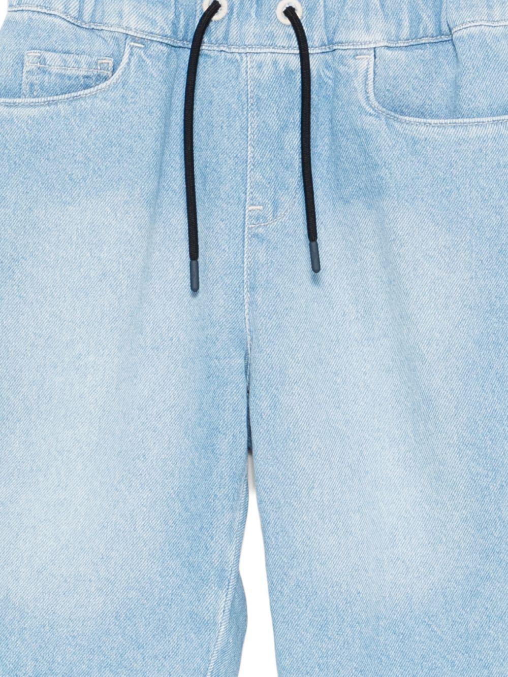 Shorts per bambino Emporio Armani Kids con due tasche laterali - Rubino Kids