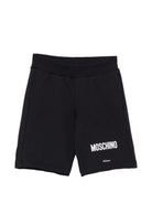 Shorts per bambino Moschino Kids neri con logo sul davanti - Rubino Kids