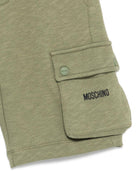 Shorts per bambino Moschino Kids verde con logo sul davanti - Rubino Kids