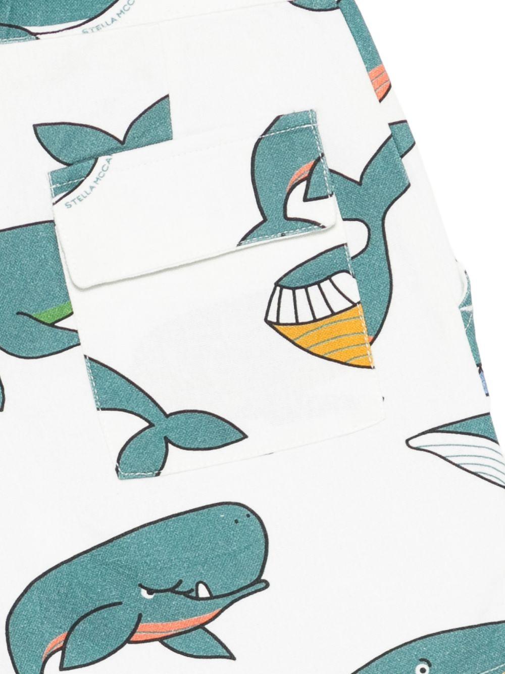 Shorts per bambino Stella McCartney Kids bianchi con stampa balene - Rubino Kids