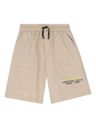 Shorts per bambino The Marc Jacobs Kids beige con logo sul davanti - Rubino Kids