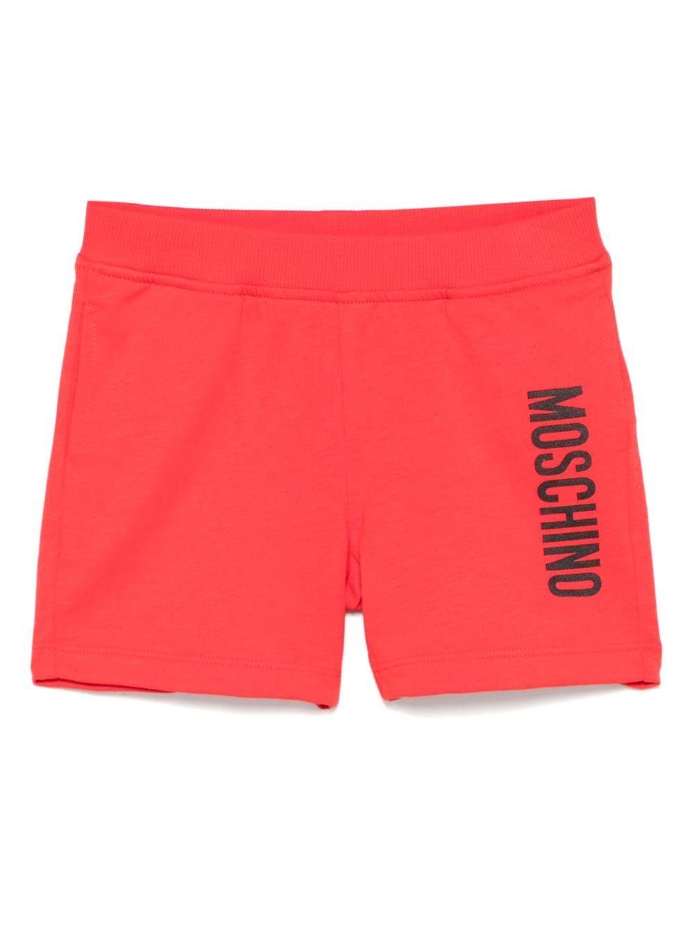 Shorts per neonato Moschino Kids rosso con stampa logo con vita elasticizzata - Rubino Kids