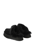 Slippers per bambina UGG Kids Disquette nero con finitura in pelliccia sintetica - Rubino Kids