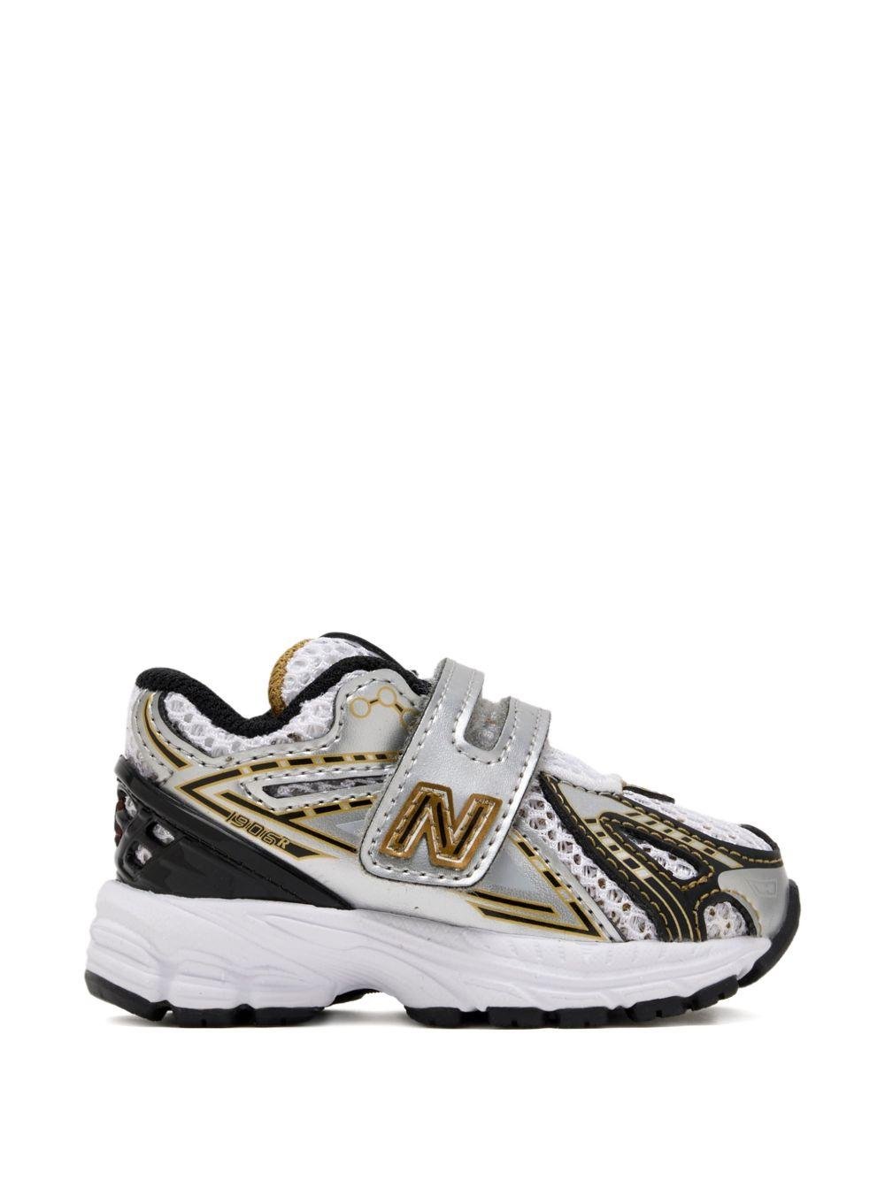 Sneakers 1906 per bambino New Balance Kids grigie con inserti a contrasto - Rubino Kids