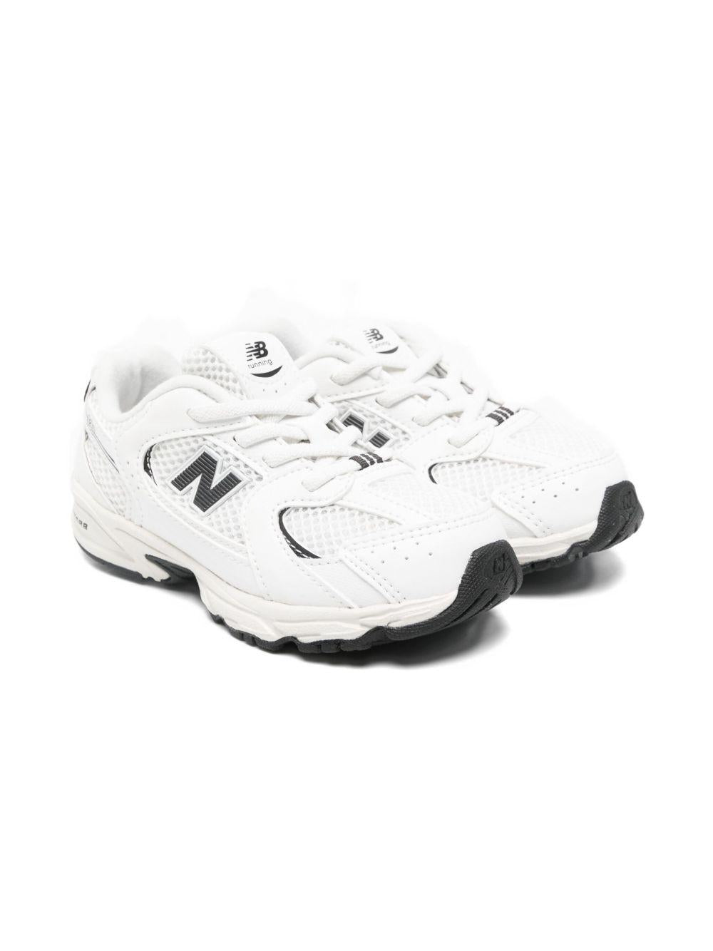 Sneakers 530 per bambino New Balance Kids bianche con pannelli in rete - Rubino Kids