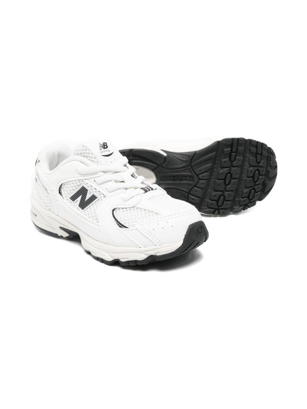 Sneakers 530 per bambino New Balance Kids bianche con pannelli in rete - Rubino Kids