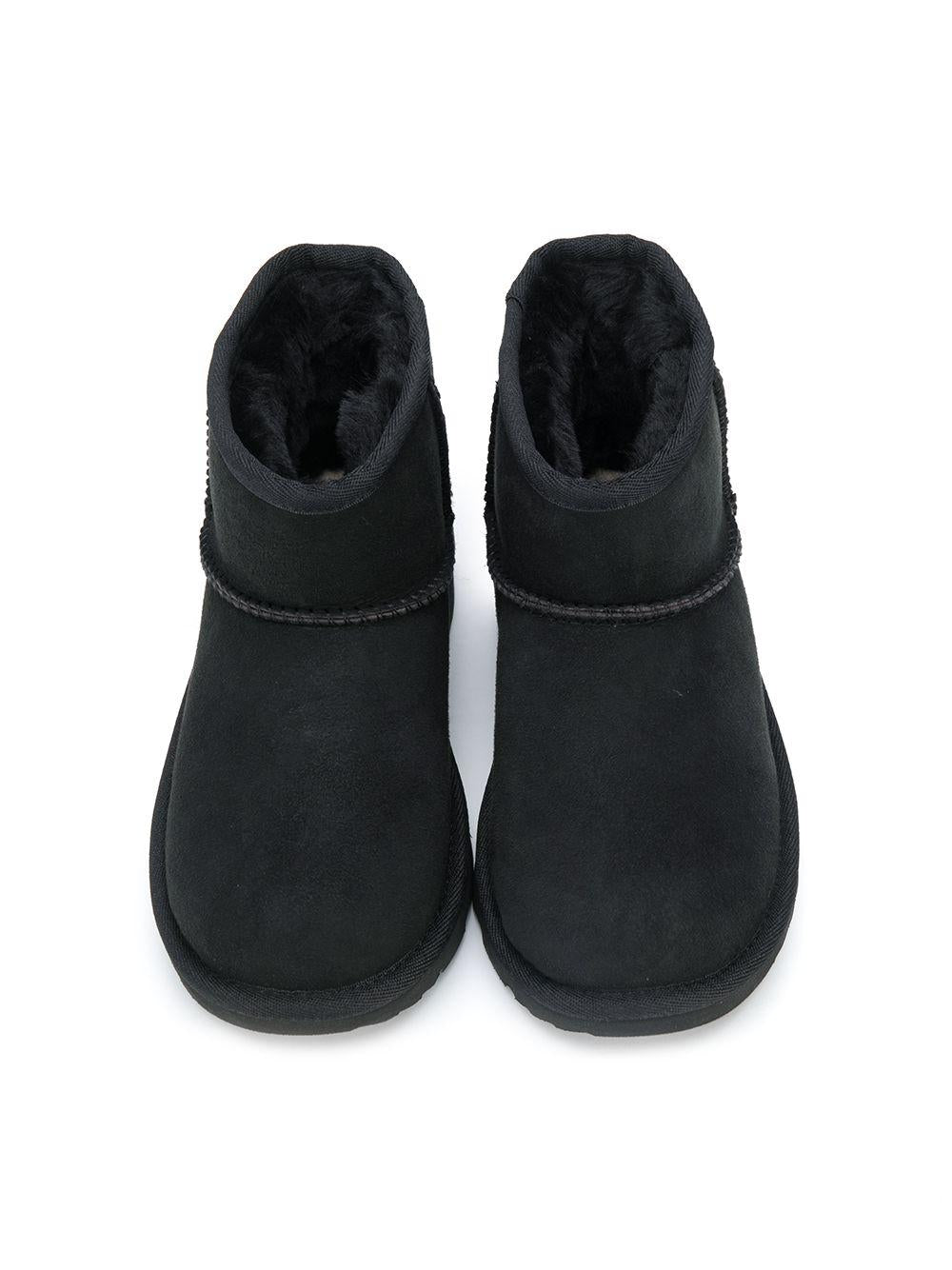 Stivali Classic Mini II per bambina UGG Kids neri con design slip - on - Rubino Kids
