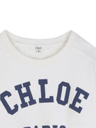 T-shirt girocollo per bambina Chloé Kids bianca con applicazione logo - Rubino Kids
