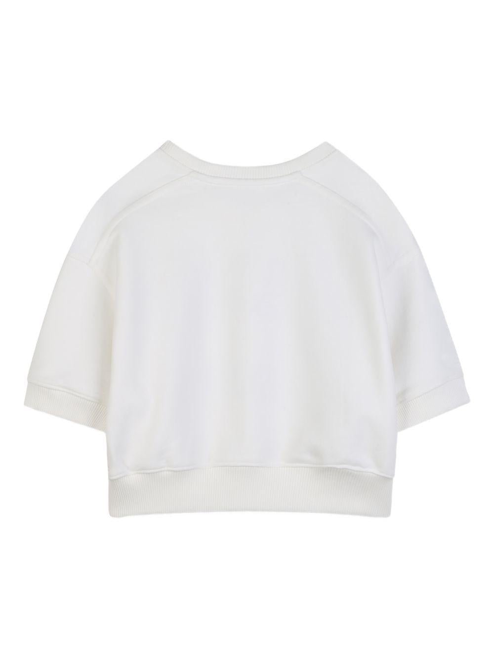 T-shirt girocollo per bambina Chloé Kids bianca con applicazione logo - Rubino Kids