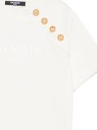 T-shirt per bambina Balmain Kids bianca con bottoni color oro sul davanti - Rubino Kids