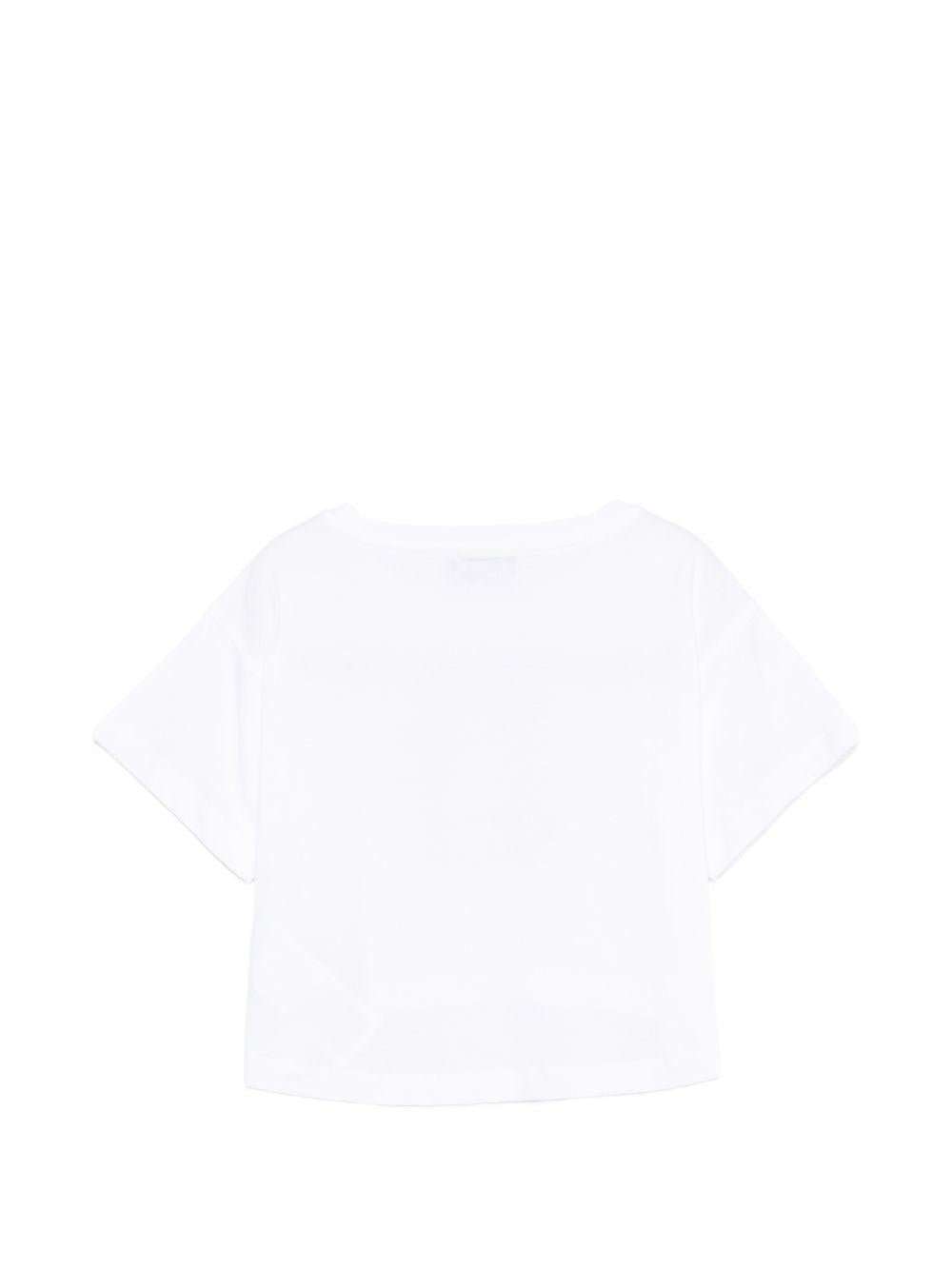 T-shirt per bambina Moschino Kids bianca con design crop - Rubino Kids